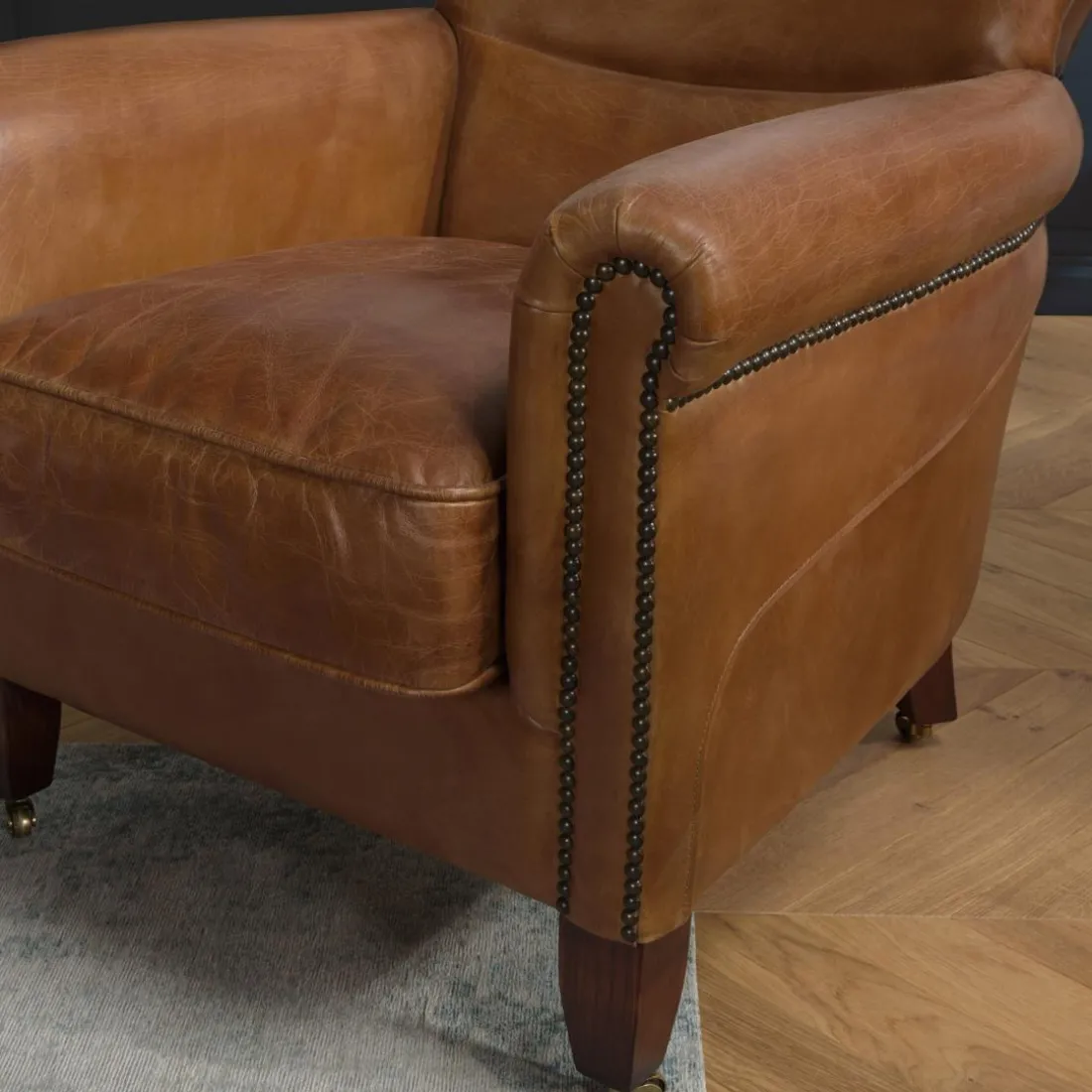 Fauteuil verone vintage cuir pieds bois avec roulettes GASTON