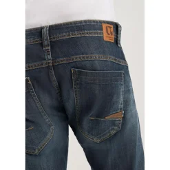 Jeans ajusté stretch 700/11, longueur 34 bleu Tom en coton
