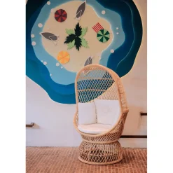 Le Fauteuil MANADO design scandinave épuré assise en rotin naturel et tissu etanche