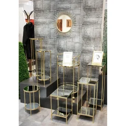 Porte plantes en métal laitonné avec étagères en verre miroir