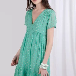 Robe courte à pois doré Flore en viscose