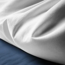 Taie d'oreiller Coton TERTIO® - Blanc/Bleu indigo