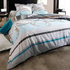 Taie d'oreiller ou traversin motif spirales - vert d'eau